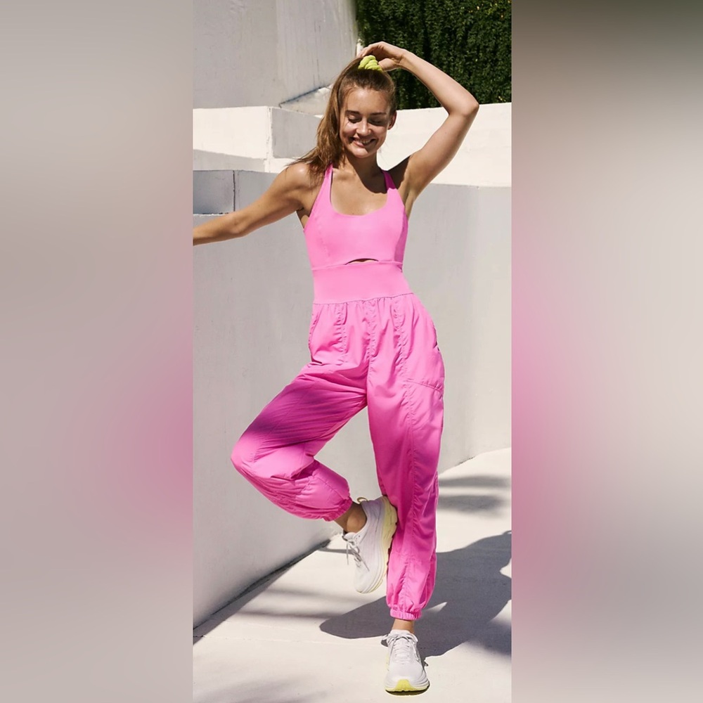 Free People FP Movement Righteous Onesie Magenta Minx Pink size XS